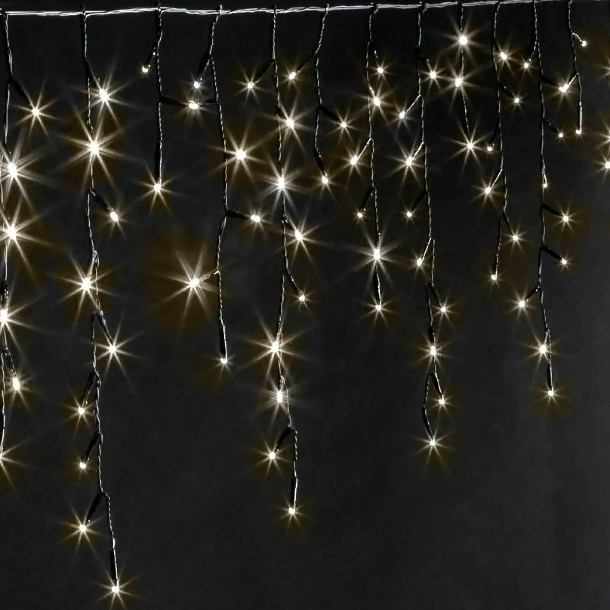 Stalactite lumineuse 11 m 259 LED câble noir Stars Blanc chaud